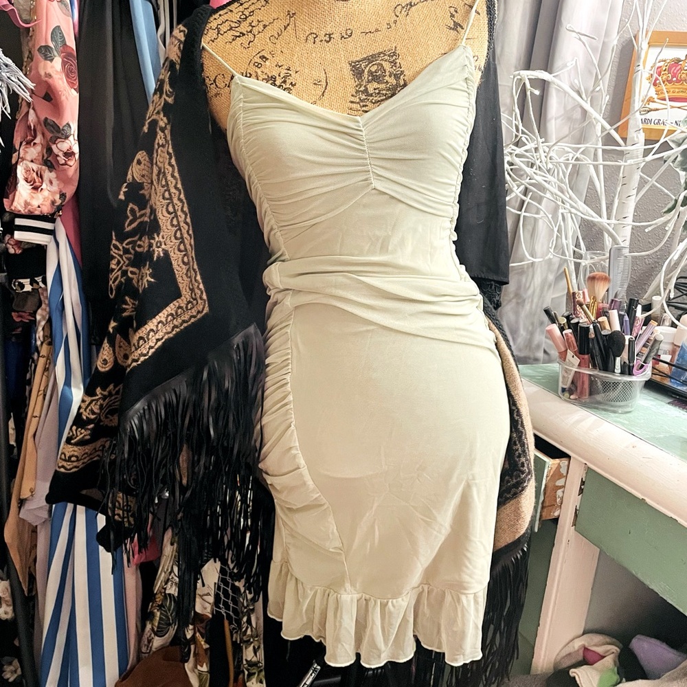 Light hazel dress comes w/ blk n gold poncho and blk boots.